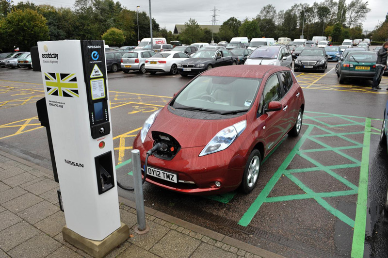 A Nissan Leaf at a new rapid charger at South Mimms Welcome Break service station