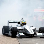Lucas di Grassi performs donuts at the Qualcomm launch event using the prototyre Formula E car