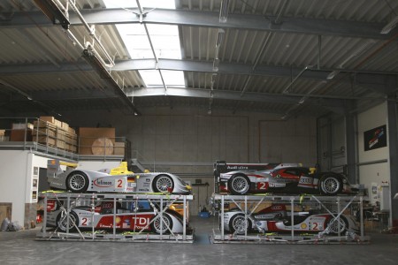 Race cars are transported to the overseas races by cargo aircraft